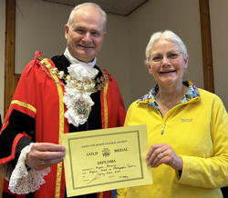 Angela Bamping receives award for highest points in photography